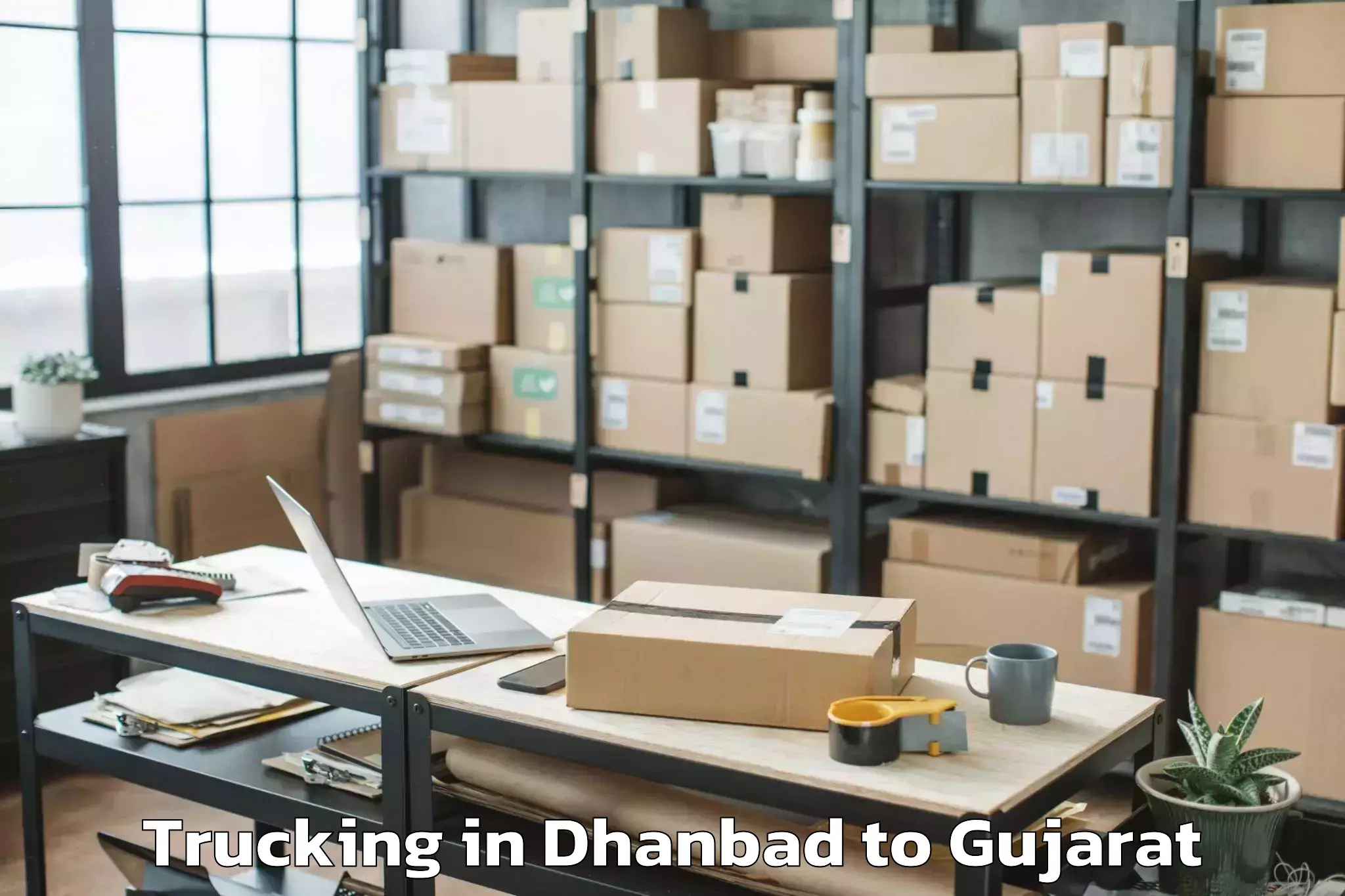 Trusted Dhanbad to Khambha Trucking